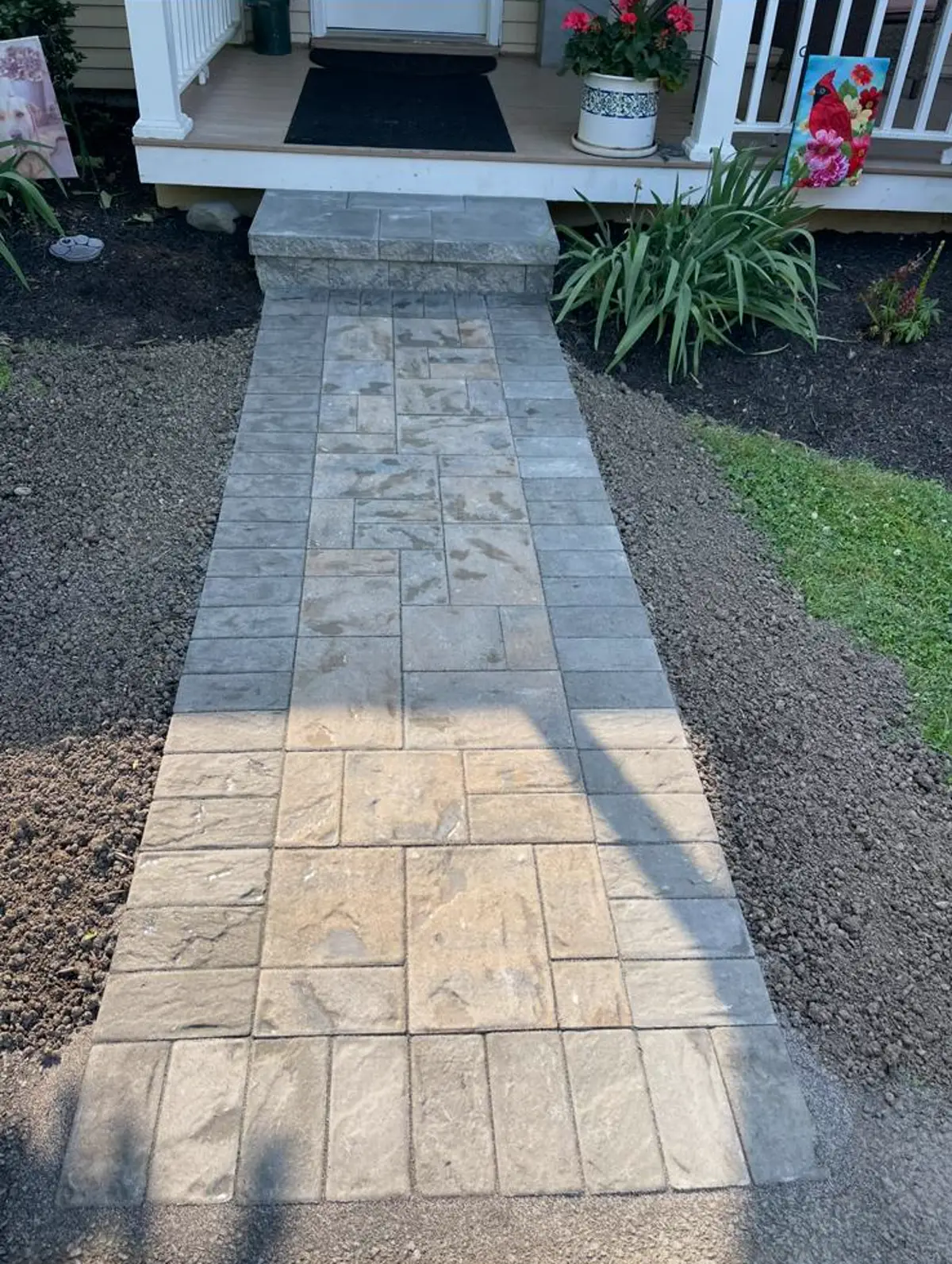 Straight paver entry walkway with dark border